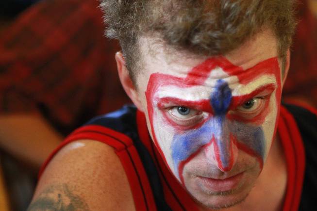 Mike Cobb wears red, white and blue face paint while watching soccer at the Hofbrauhaus as the United States takes on Germany in their Group G game at the World Cup in Brazil Thursday, June 26, 2014.