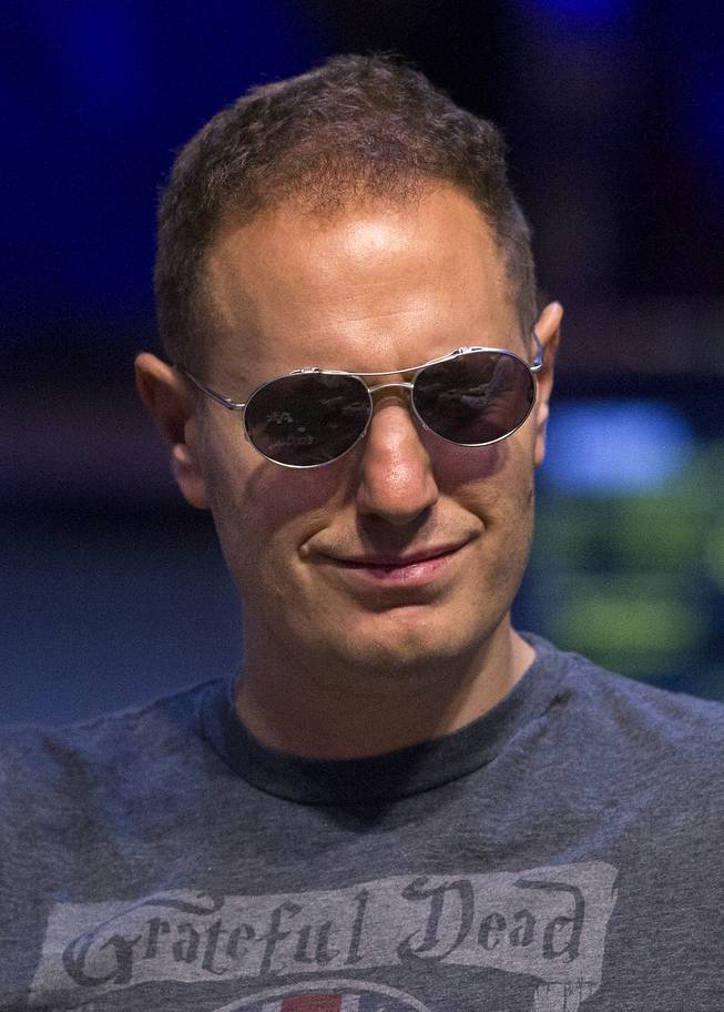 WSOP player Jesse Martin is amused by the chatter at the table during the Poker Players Championship final table of professional poker players at the Rio on Thursday, June 26, 2014.