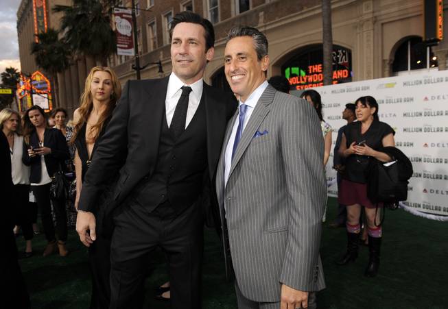 Jon Hamm, left, and JB Bernstein arrive at the world premiere of "Million Dollar Arm" at El Capitan Theatre on Tuesday, May 6, 2014, in Los Angeles. 