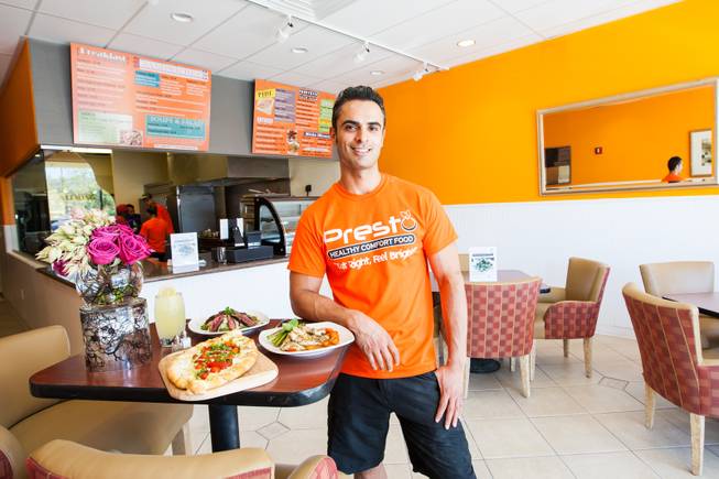 Owner Reza Arshadi prepares for his opening in July at his new restaurant Pesto Cafe located at 19 S. Stephanie Street in Henderson, Nev. Friday, June 28, 2014.