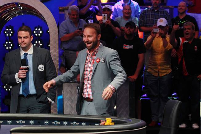 Daniel Negreanu reacts after drawing a Jack, Ace and 4 on the flop for his Ace and 4 during the final table of the Big One For One Drop tournament at the World Series of Poker Tuesday, July 1, 2014 at the Rio. Daniel Colman took home first place and $15,306,668 in prize money.