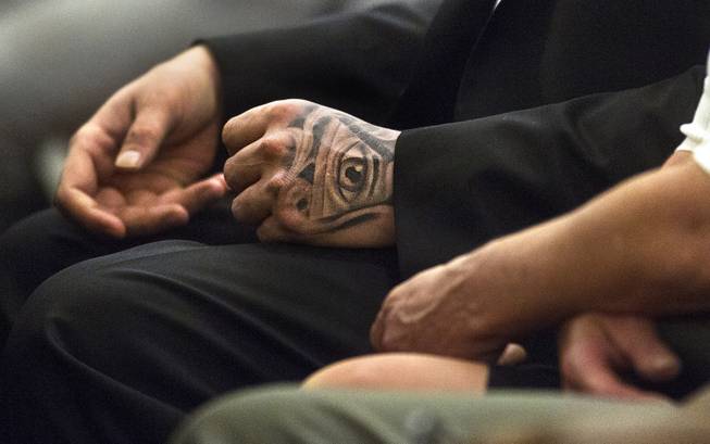 Jim Edward Johnson, who told police he accidentally shot his friend while filming a rap video at the Palms, appears in Justice Court for a prelim hearing on Tuesday, July 1, 2014. He sports a tattoo on his had which appears to be the Eye of Providence. L.E. Baskow