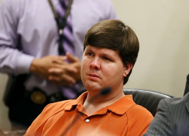 Justin Ross Harris, the father of a toddler who died after police say he was left in a hot car for about seven hours, sits for his bond hearing in Cobb County Magistrate Court, Thursday, July 3, 2014, in Marietta, Ga.