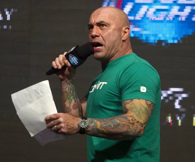 Joe Rogan introduces the next fighters during the UFC 175 weigh ins at the Mandalay Bay Resort on Friday, July 4, 2014.
