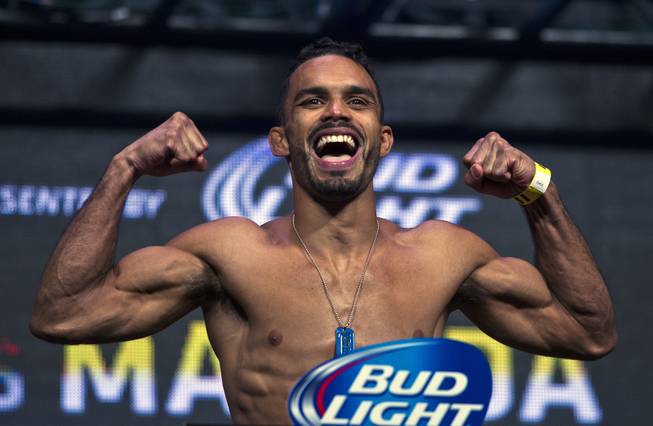 Bantamweight Rob Font smiles for the fans during the UFC 175 weigh ins at the Mandalay Bay Resort on Friday, July 4, 2014.