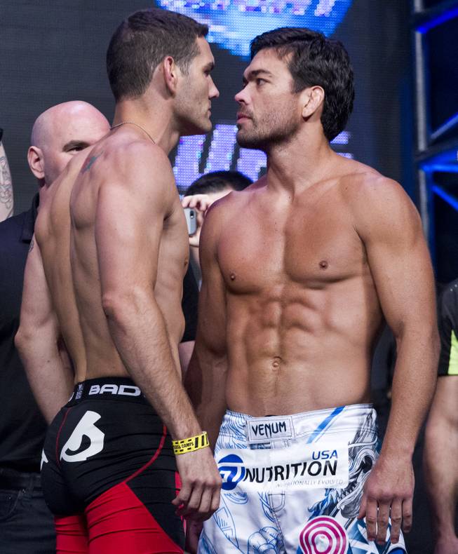 World Middleweight Champion Chris Weidman faces off with contender Lyoto Machida during the UFC 175 weigh ins at the Mandalay Bay Resort on Friday, July 4, 2014.