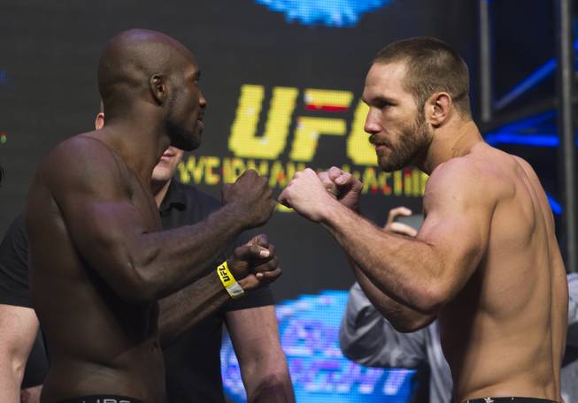 Middleweight Kevin Casey stands with opponent Bubba Bush during the UFC 175 weigh ins at the Mandalay Bay Resort on Friday, July 4, 2014.
