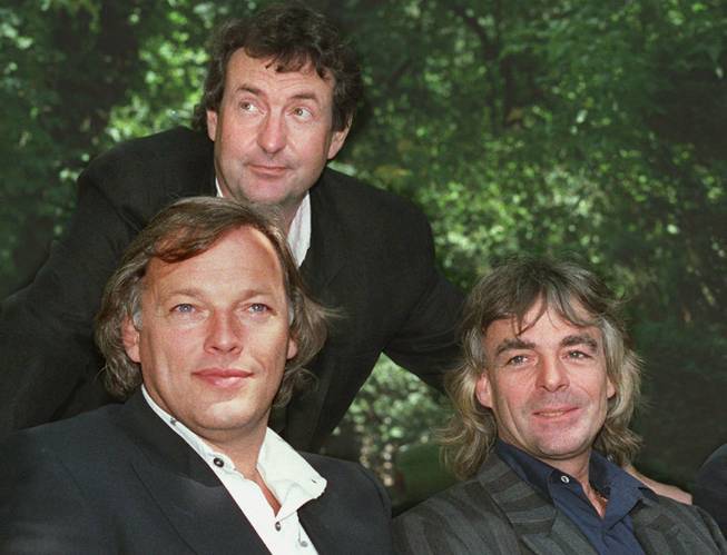 Members of the rock group Pink Floyd, from left, David Gilmour, Nick Mason and Richard Wright, are shown in this 1988 photo.