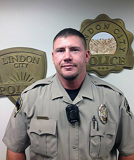 This undated file photo released by the Lindon City Police Department shows police officer Joshua Boren from Lindon, Utah. 