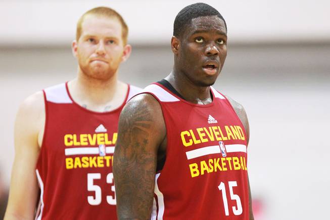 Cleveland center Alex Kirk, left, and forward Anthony Bennett take part in the Cavaliers NBA Summer League game against the Milwaukee Bucks Friday, July 11, 2014 at the Cox Pavilion.