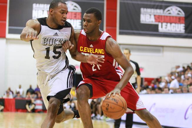 Milwaukee forward Chris Wright guards Cleveland's 2014 number one draft pick Andrew Wiggins during their NBA Summer League Friday, July 11, 2014 at the Cox Pavilion.