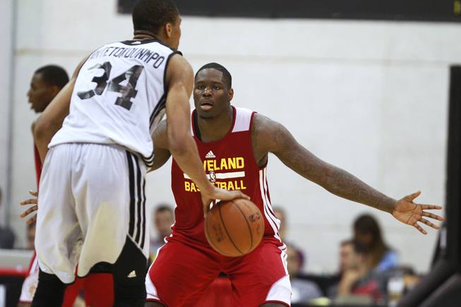 Cleveland forward Anthony Bennett guards Milwaukee forward Giannis Antetokounmpo during their NBA Summer League Friday, July 11, 2014 at the Cox Pavilion.