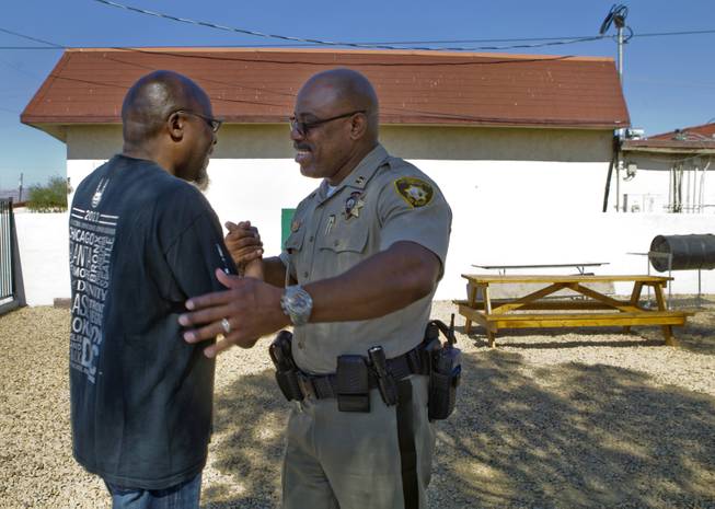 Capt. Will Scott of the Las Vegas Metro Police Department's Bolden Area Command visits the Masjid As-Sabur on Thursday, June 5, 2014.