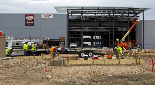Workers with Martin-Harris Construction continue their tasks as the new Las Vegas Harley-Davidson Motorcycle dealership on the South Strip is under construction on Thursday, July 10, 2014.