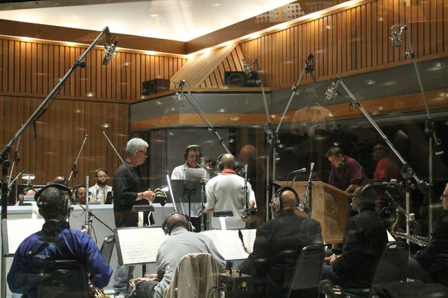 Clint Holmes and members of the Count Basie Orchestra record an upcoming album in Studio A, aka the “Grammy Studio,” at Capitol Records on Thursday, July 10, 2014, in Los Angeles.

