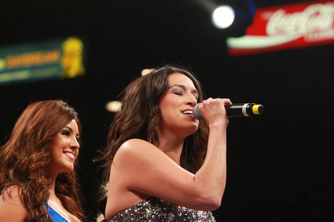 Amanda Avila sings the national anthem before the Saul "Canelo" Alvarez vs. Erislandy Lara super-welterweight fight Saturday, July 12, 2014, at MGM Grand Garden Arena.