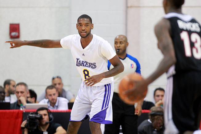 Los Angeles forward Roscoe Smith positions his teammates during their NBA Summer League game against Toronto Friday, July 11, 2014 at Cox Pavilion.