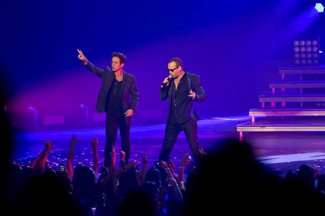 Joe McIntyre and Donnie Wahlberg of New Kids on the Block perform in the Axis at Planet Hollywood on Thursday, July 10, 2014.