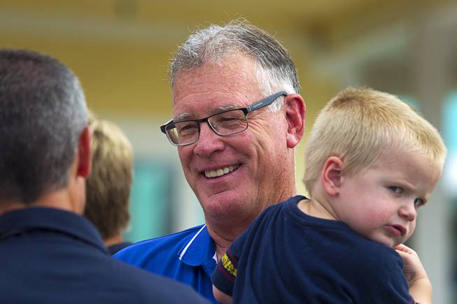 Henderson Mayor Andy Hafen holds his grandson Isaac Stewart, 2, before an official opening ceremony for the Cowbunga Bay water park in Henderson Monday, July 14, 2014. The new water park opened on July 4. STEVE MARCUS