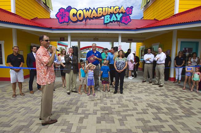 Scott Muelrath, left, president and CEO of the Henderson Chamber of Commerce, speaks during an official opening ceremony for the Cowbunga Bay water park in Henderson Monday, July 14, 2014. The new water park opened on July 4. STEVE MARCUS