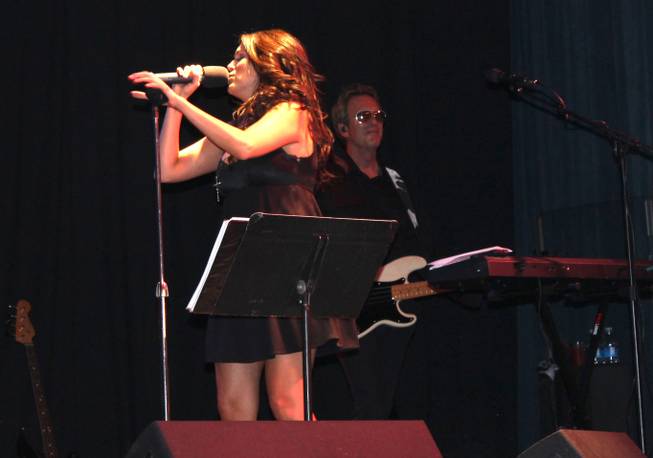 Amanda Avila performs with Venus Rising on Saturday, July 12, 2014, in the Lounge at Excalibur.
