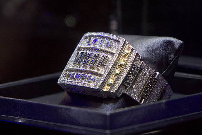 The championship bracelet is displayed during the World Series of Poker $10,000 buy-in No-limit Texas Hold 'em main event at the Rio Monday, July 14, 2014.