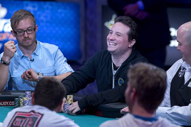 Bruno Politano of Brazil smiles after winning a hand during the World Series of Poker $10,000 buy-in No-limit Texas Hold 'em main event at the Rio, July 14, 2014. Politano made it to the final table. Politano is the first Brazilian to make the WSOP Main Event final table.