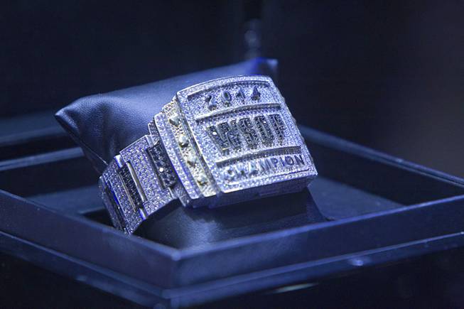 The championship bracelet is displayed during the World Series of Poker $10,000 buy-in No-limit Texas Hold 'em main event at the Rio Tuesday, July 15, 2014.