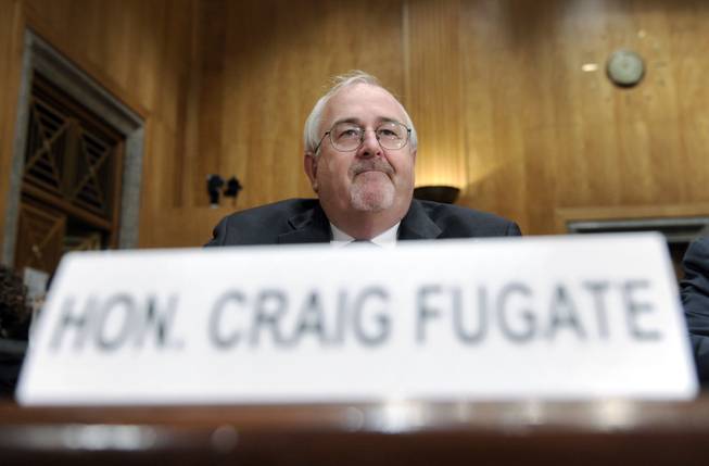 Federal Emergency Management Agency (FEMA) Administrator Craig Fugate prepares to testify on Capitol Hill in Washington, Wednesday, July 9, 2014, before the Senate Homeland Security and Governmental Affairs Committee hearing on the problems with the increased rise in apprehensions at the Southern border. Top Obama administration officials told senators Wednesday they're struggling to keep up with the surge of immigrants at the Southern border. 