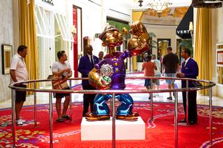 A Popeye sculpture is displayed in the Wynn Esplanade Thursday, July 17, 2014. The stainless steel sculpture, by American artist Jeff Koons, was purchased at auction for $28.2 million.