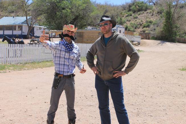 Misha "10 Pack" Furmanczyk confers with videographer Mike Thompson during the recording of Melody Sweets' "Shoot 'em Up" video at Grand Canyon Ranch on April 22, 2014.