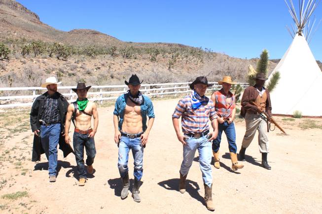 The unlikely cowboy lineup of, from left, Jake Alberda, Ming Hukari, Misha "10 Pack" Furmanczyk, Sergie Matvienko, Lucasz Sczerba and Kyle Vonn Elzey, during the video shoot for Melody Sweets' "Shoot 'em Up" at Grand Canyon Ranch on April 22, 2014.