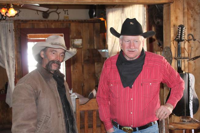 "The Singing Cowboy," Casey Adams, right, and his sidekick who came to be known only as Dusty, during the video shoot for Melody Sweets' "Shoot 'em Up" at Grand Canyon Ranch on April 22, 2014.