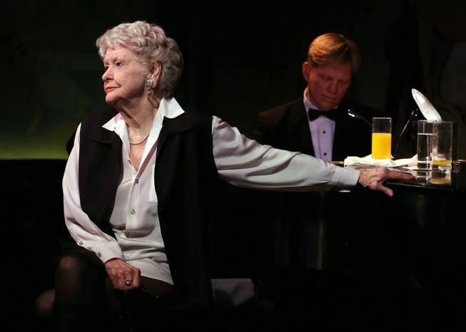 This April 2, 2013, file image released by the O+M Company shows Elaine Stritch performing her final engagement at the Cafe Carlyle in New York with Rob Bowman at the piano. Stritch died Thursday, July 17, 2014, at her home in Birmingham, Mich. She was 89.