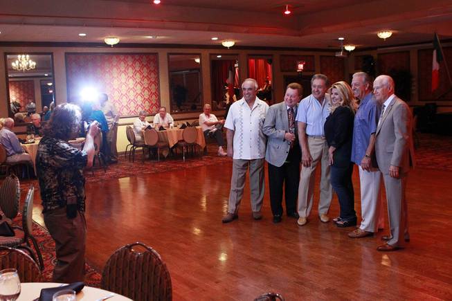 Michelle Fiore has her photo taken with attendees of the Fiore Club luncheon May 8, 2014 at the Italian American Social Club.