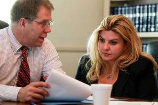 Michelle Fiore meets with legal counsel Craig Mueller May 8, 2014.