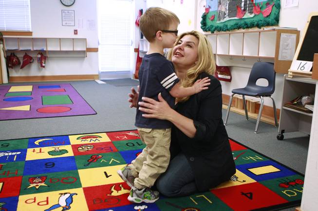 Michelle Fiore greets her grandson Jake Willis while picking him up from preschool May 8, 2014.
