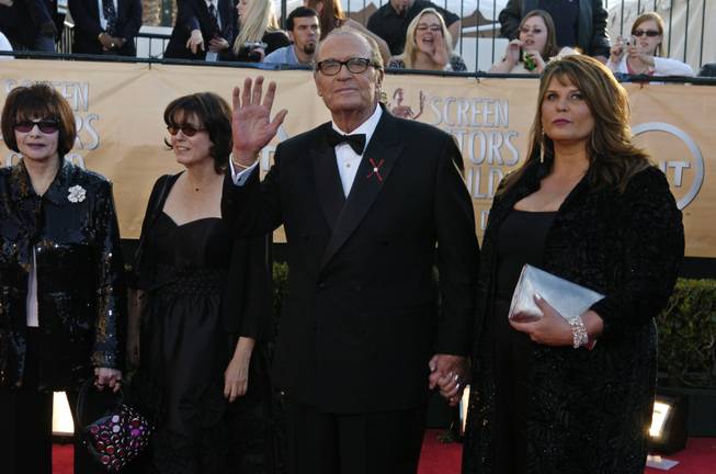 James Garner arrives with his family, including his wife Lois Clarke, far left, for the 11th annual Screen Actors Guild Awards in this Saturday, Feb. 5, 2005, file photo taken in Los Angeles. He was given the 41st annual life achievement award at the show. Garner, wisecracking star of TV's "Maverick" who went on to a long career on both small and big screen, died Saturday, July 19, 2014, according to Los angeles police. He was 86.