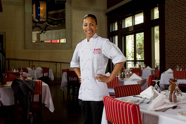 Chef Fatimah Madyun poses in Rao's, an Italian restaurant at Caesars Palace, Monday, July 21, 2014.