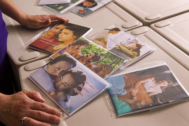 Greeting cards are displayed at the Teazled offices Monday, July 21, 2014. Teazled is a company that makes "traditional greeting cards for nontraditional familes."