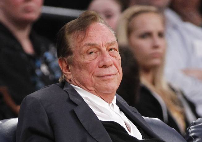 FILE - In this Dec. 19, 2011 file photo, Los Angeles Clippers owner Donald Sterling watches the Clippers play the Los Angeles Lakers during an NBA preseason basketball game in Los Angeles. The future of the Clippers is closer to decision as testimony resumes Monday, July 21, 2014, in a probate trial over whether a deal negotiated by Donald Sterling's estranged wife to sell the team for $2 billion is authorized under a Sterling family trust. 