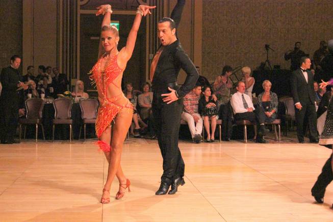 Tania Reis and Vartan Zakhariants dance together at the Nevada Star Ball held at the Green Valley Ranch Hotel in August 2013. Zakhariants owns Las Vegas'  VZ Dance Studio and Reis is a teacher there.
