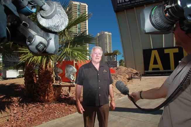 Westgate Resorts founder David Siegel gives a TV interview at the unveiling of the sign for the former LVH on Wednesday, July 22, 2014.
