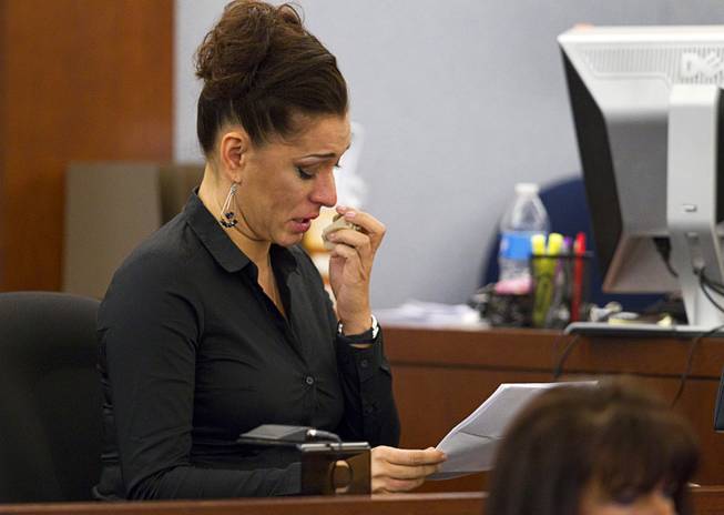 Celeste Flores Narvaez, older sister of Deborah Flores Narvaez, reads a statement during sentencing for Jason Griffith at the Regional Justice Center Wednesday, July 23, 2014. The former Las Vegas Strip performer was found guilty of second-degree murder in the 2010 death and dismemberment of his ex-girlfriend Deborah Flores Narvaez, a dancer in Luxor's topless "Fantasy" revue.
