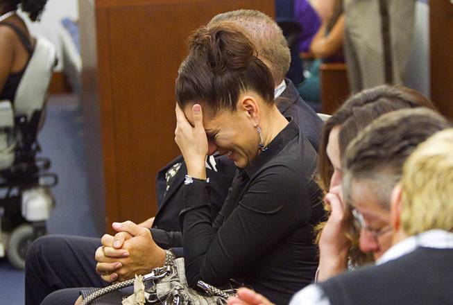 Celeste Flores Narvaez, older sister of Deborah Flores Narvaez, reacts as Jason Griffith is sentenced to life in prison during sentencing at the Regional Justice Center Wednesday, July 23, 2014. The former Las Vegas Strip performer was found guilty of second-degree murder in the 2010 death and dismemberment of his ex-girlfriend Deborah Flores Narvaez, a dancer in Luxor's topless "Fantasy" revue.
