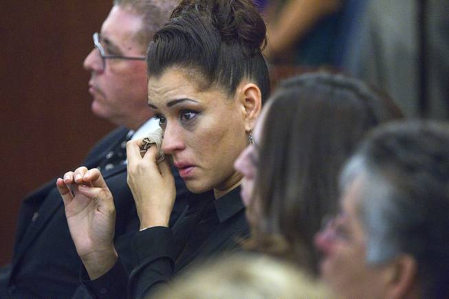 Celeste Flores Narvaez, older sister of Deborah Flores Narvaez, wipes away a tear during sentencing for Jason Griffith at the Regional Justice Center Wednesday, July 23, 2014. The former Las Vegas Strip performer was found guilty of second-degree murder in the 2010 death and dismemberment of his ex-girlfriend Deborah Flores Narvaez, a dancer in Luxor's topless "Fantasy" revue.