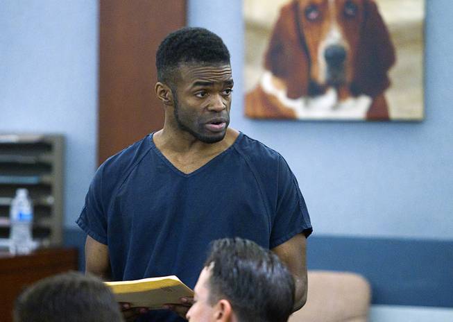Jason Griffith speaks to his mother (not pictured) before his sentencing at the Regional Justice Center Wednesday, July 23, 2014. The former Las Vegas Strip performer was found guilty of second-degree murder in the 2010 death and dismemberment of his ex-girlfriend Deborah Flores Narvaez, a dancer in Luxor's topless "Fantasy" revue.