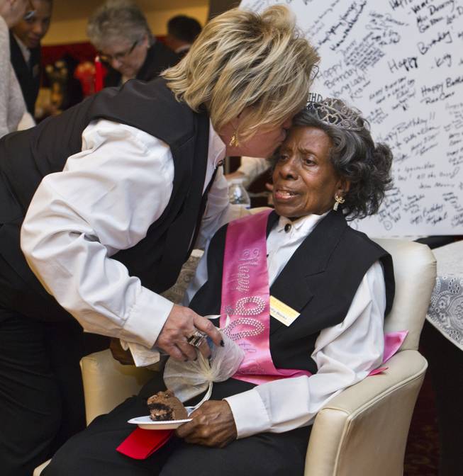 Colosseum usher Dorothy Brooks is kissed by usher Linda Flathau as she turns 90 today and is thrown a birthday party there before the Shania show at Caesars Palace on Wednesday, July 23, 2014.