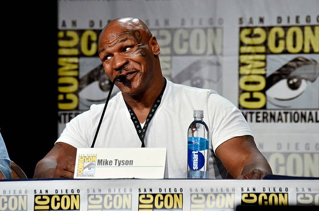 Mike Tyson attends the "Mike Tyson Mysteries" panel on Day 2 of Comic-Con International on Friday, July 25, 2014, in San Diego.