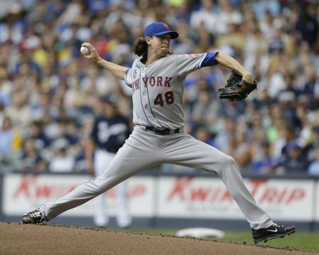 New York Mets starting pitcher Jacob deGrom throws to the Milwaukee Brewers during the first inning Sunday, July 27, 2014, in Milwaukee.